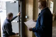Data center employee authenticating at a secured door